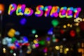 Pub Street in Siem Reap, Cambodia - blurry abstract photo of colorful night lights. Outdoor night life blurred view. Royalty Free Stock Photo