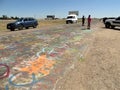 Graffiti on roadway, Cadillac Ranch, Interstate 40 frontage road, Amarillo, Texas