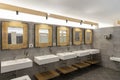 Public bathroom with five sinks, mirrors and soap dispensers. Modern and simple Royalty Free Stock Photo