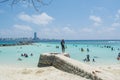 Public beach full of local people at the Villingili island