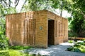 Modern public bricks toilet building at the park background Royalty Free Stock Photo