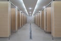 Public building are perspective womans toilets : wooden wall and wooden doors with bright downlight - lavatory design, luxury