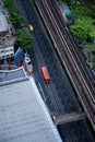 Public bus driving on highway and skytrain railway in Bangkok