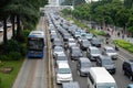 Public bus passes heavy traffic jam during rush hour in Jakarta, Indonesia Royalty Free Stock Photo