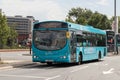 Public Bus service with display saying face covering must be worn, exact fares only.  Public transport and travel Royalty Free Stock Photo