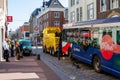 Public bus stuck on retractable bollards with tow truck