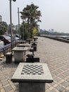 Public chess tables boards, Carter beach, Mumbai. Royalty Free Stock Photo