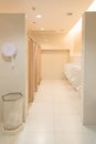 Public clean modern white male toilet, restroom with urinals, in Royalty Free Stock Photo