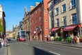 Public double decker bus at typical street in Edinburgh Royalty Free Stock Photo