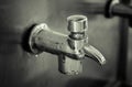 Public faucet and water drop Royalty Free Stock Photo