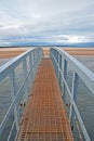 Public footbridge over sea at Belhaven, Dunbar, Scotland Royalty Free Stock Photo