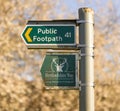 Public Footpath sign and Hertfordshire Way sign on a post in the countryside. UK Royalty Free Stock Photo