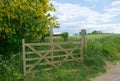 Public footpath sign. Wooden gate. Royalty Free Stock Photo