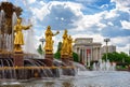 Public fountain of friendship of the people view at VDNH city park exhibition, blue sky and clouds in Moscow, Russia