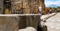 public fountain with hercules that kills the lion in the streets of Pompeii