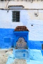 Public fountain on a street in Chefchaouen