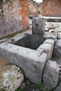 Public fountain in the streets of Pompeii Royalty Free Stock Photo