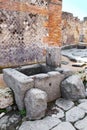 Public fountain in the streets of Pompeii Royalty Free Stock Photo