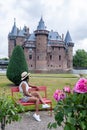 Public garden of Castle de Haar in Utrecht Netherlands, people relaxing in the park near the castle in Holland Utrecht Royalty Free Stock Photo
