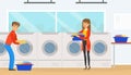 Public Laundrette with Laundromat Washing Machines, People Visiting Laundry Loading Clothes for Washing and Drying