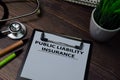Public Liability Insurance write on paperwork isolated on wooden table Royalty Free Stock Photo