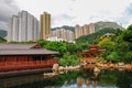 Public Nan Lian garden in the center of the city, a view of a Chinese cedar wood pagoda with a tea house inside. Royalty Free Stock Photo