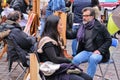 A public painter paints for a tourist in Place du Tertre square in Paris' XVIIIe arrondissement (Montmartre) Royalty Free Stock Photo