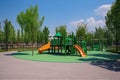 public park with playground equipment, for children's recreation and play Royalty Free Stock Photo