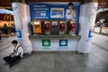 Public payphone and top up machine at BTS train station