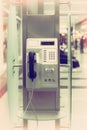 Public phone in airport hall Royalty Free Stock Photo