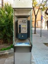 Public phone booth in Spain city Badalona Royalty Free Stock Photo