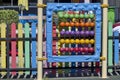 Public playground with abacus for children practicing counting with bright colored wooden beads Royalty Free Stock Photo