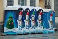 Public Portable toilets on the street in Moscow. Street art graffiti of snowmen and christmas tree on public toilets