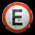 Public Road Sign In Red And White With A Capitol Letter E In The Center Isolated On Black Background. 3d