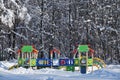 Empty kids playground in winter city park Royalty Free Stock Photo