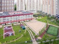 Public school building. Exterior view of school building with playground mixed-use urban multi-family residential Royalty Free Stock Photo