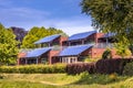 Public school building with solar panels as sun protection Royalty Free Stock Photo