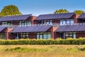 Public school building with solar panels as sun protection Royalty Free Stock Photo