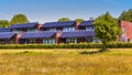 Public school building with solar panels as sun protection Royalty Free Stock Photo