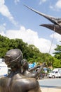 Public sculpture of fishermen landing a sailfish