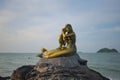 The public sculpture of Songkla Golden Mermaid in the morniing scene at Samila Beach, Songkhla, Thailand