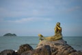 The public sculpture of Songkla Golden Mermaid in the morniing scene at Samila Beach, Songkhla, Thailand Royalty Free Stock Photo