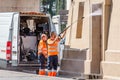 Public service worker washing historical building using water jet Royalty Free Stock Photo