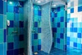 Public shower room with several showers