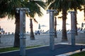 Public showers on sandy beach at sunset. Traveling and vacation concept Royalty Free Stock Photo