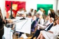 Public speaker at business conference, corporate coaching, political or media event Royalty Free Stock Photo