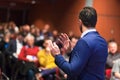 Public speaker giving talk at Business Event. Royalty Free Stock Photo