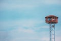 Public speaker tower with two birds perching on Royalty Free Stock Photo