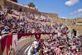 Public on the steps of an ancient Roman theater