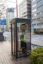 a public telephone booth in Tokyo, Japan Royalty Free Stock Photo